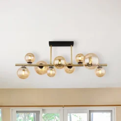 Deckenlampe Riha, Länge 87 cm, amber/messingfarben, 9-flg.