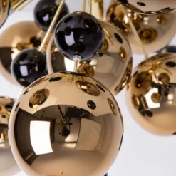 Deckenleuchte Explosion mit goldenen Kugeln