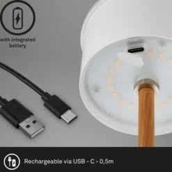 LED-Akku-Tischleuchte Kiki, schwarz/gold, IP44, 3.000K