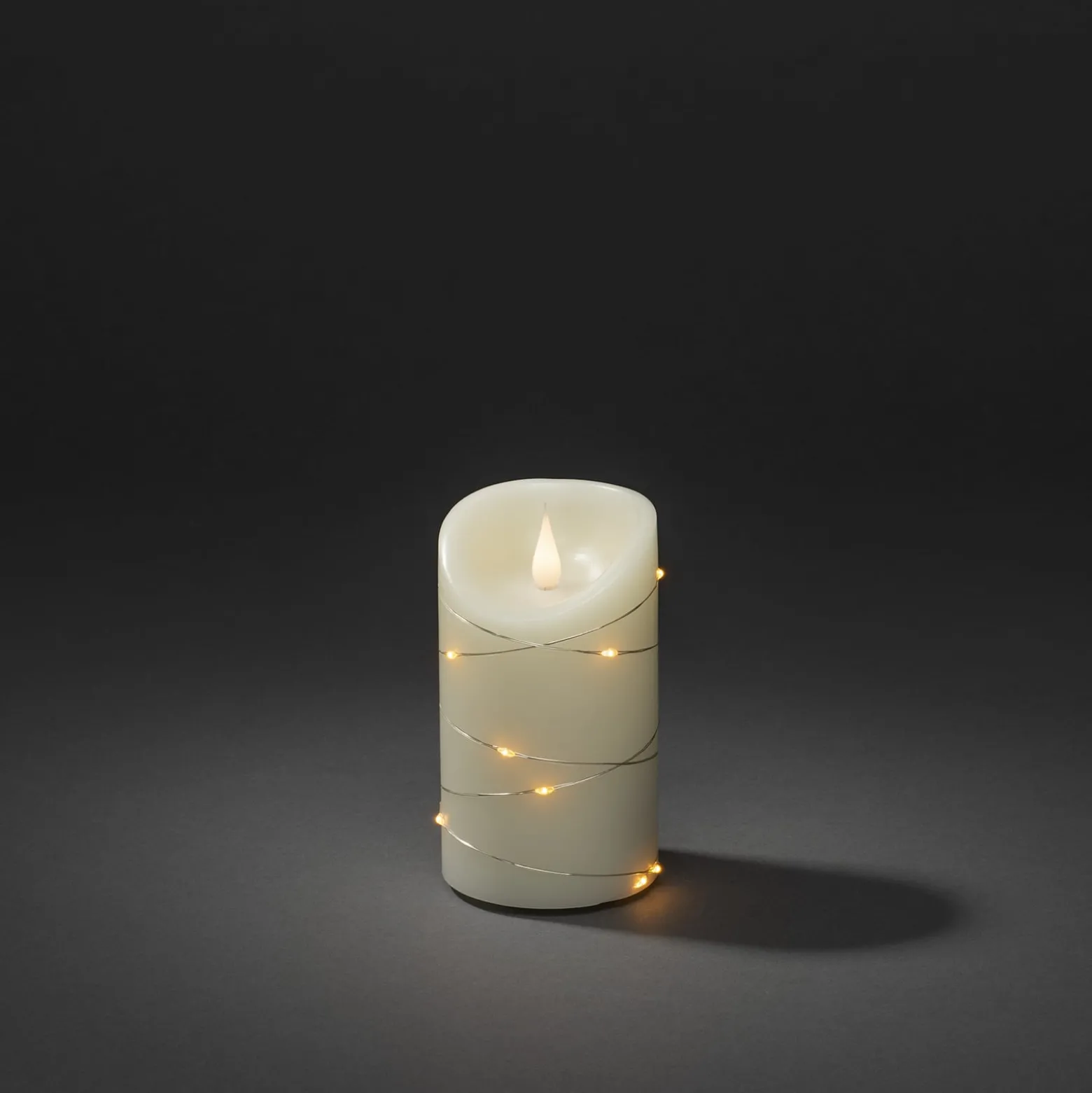 LED-Wachskerze creme Lichtfarbe Bernstein Höhe13cm