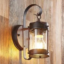 Lindby Außenwandleuchte Farly, rostbraun, Alu, 17cm