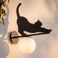 Lindby Außenwandleuchte Katti, Metall, schwarz, IP44, Katze