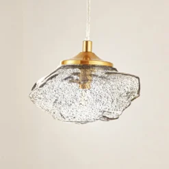 Lindby Hängeleuchte Piatra, rauch/messing, Glas, Ø 16 cm, G9
