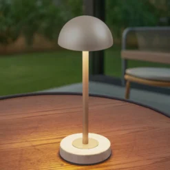Lindby LED-Akku-Tischlampe Pippin, gold/travertin, IP44