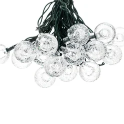 Lindby LED-Solar-Lichterkette Mionel, Kugeln, 30-flg., 635cm