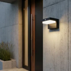 Lindby LED-Solarwandlampe Eleazar, schwarz, Sensor