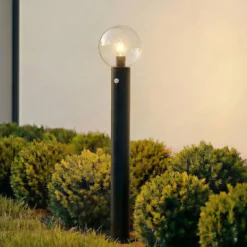 Lindby Wegeleuchte Dangan, klar, 90 cm, Glas, Sensor