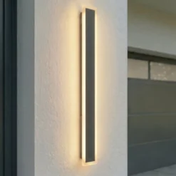 Lucande LED-Außenwandlampe Ilora, schwarz, 100 cm, CCT, IP65