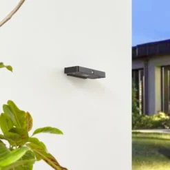 Lucande LED-Solar-Wandleuchte Tavon, eckig, schwarz, Sensor