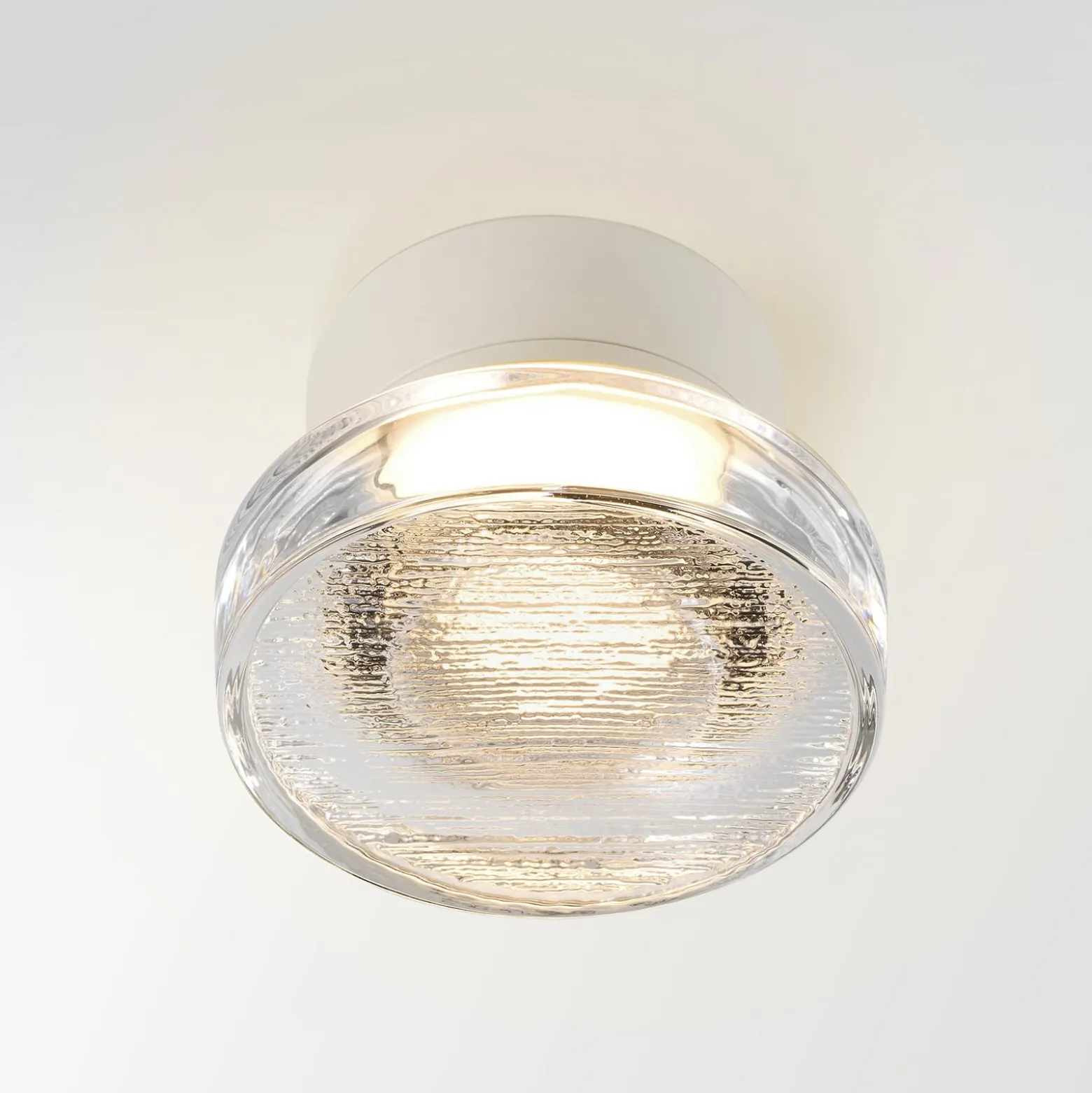 MARSET LED-Außenwandlampe Roc, Ø 14 cm, weiß/transluzent