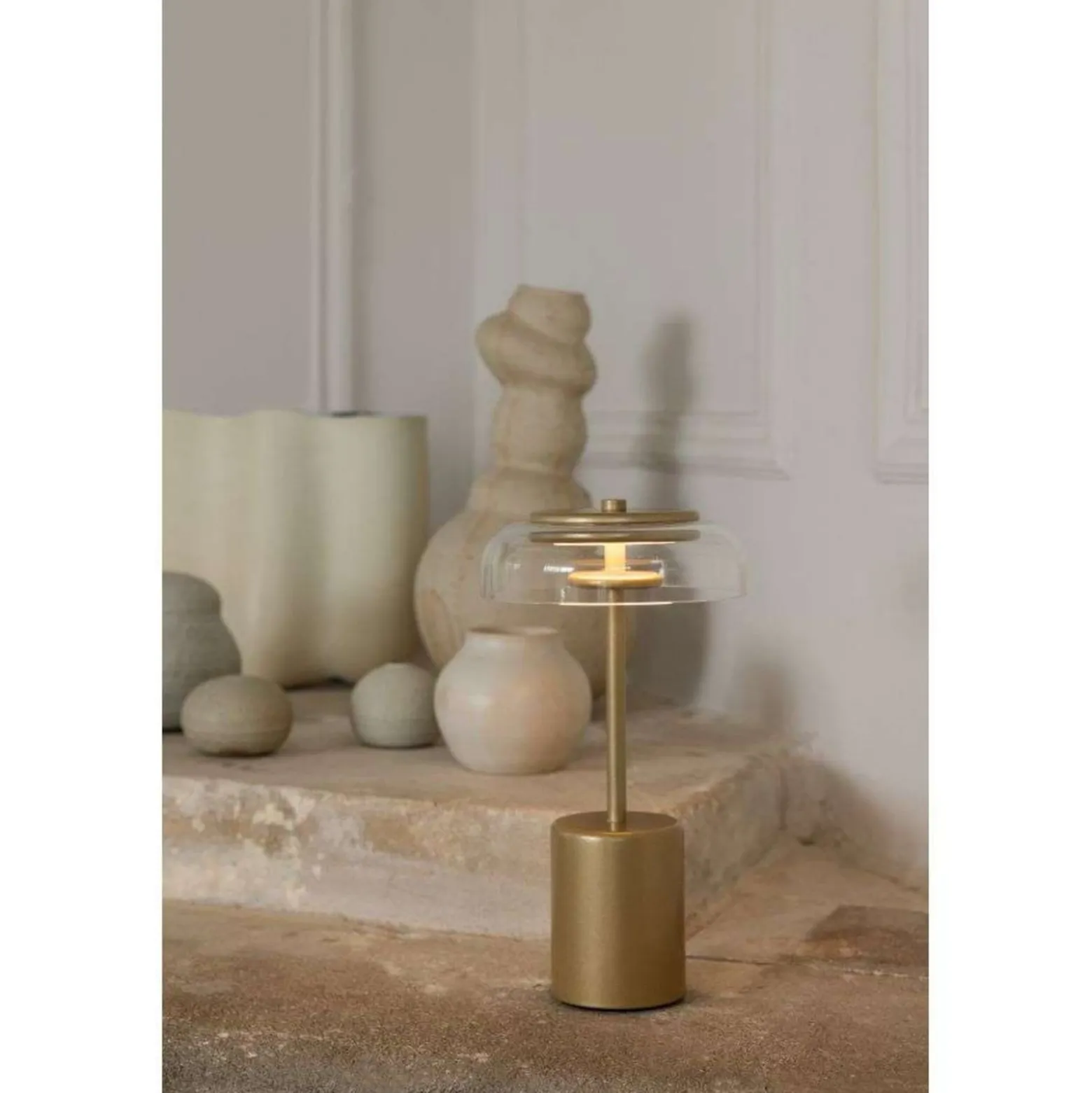 Nuura LED-Akku-Tischlampe Blossi, Höhe 26 cm goldfarben/klar