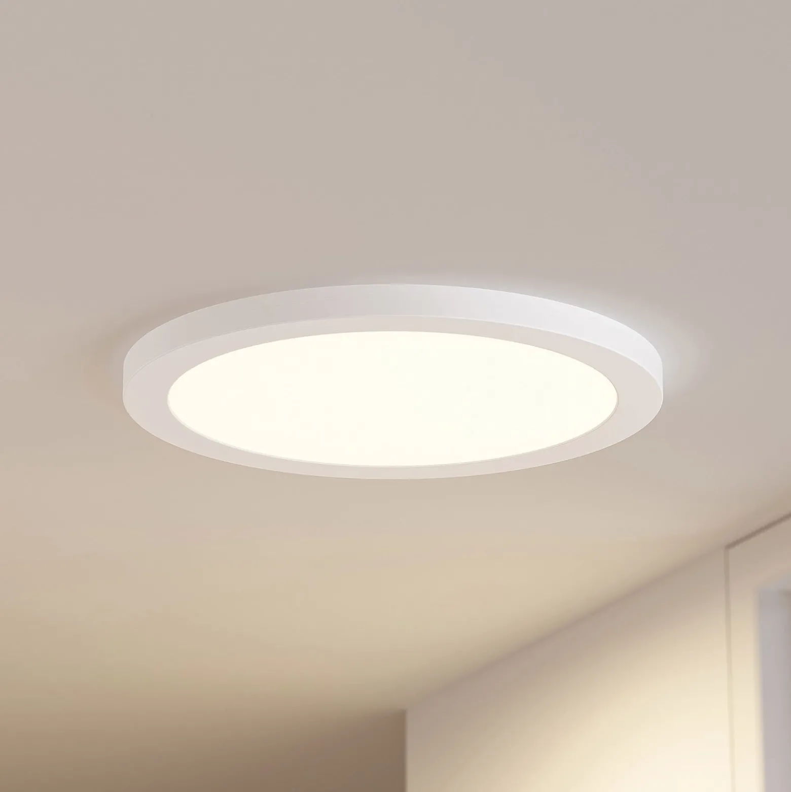 Prios LED-Deckenlampe Aureka, Bewegungsmelder, Ø 33 cm, weiß