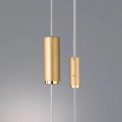 Quitani LED-Pendellampe Tolu, Länge 119 cm, messing