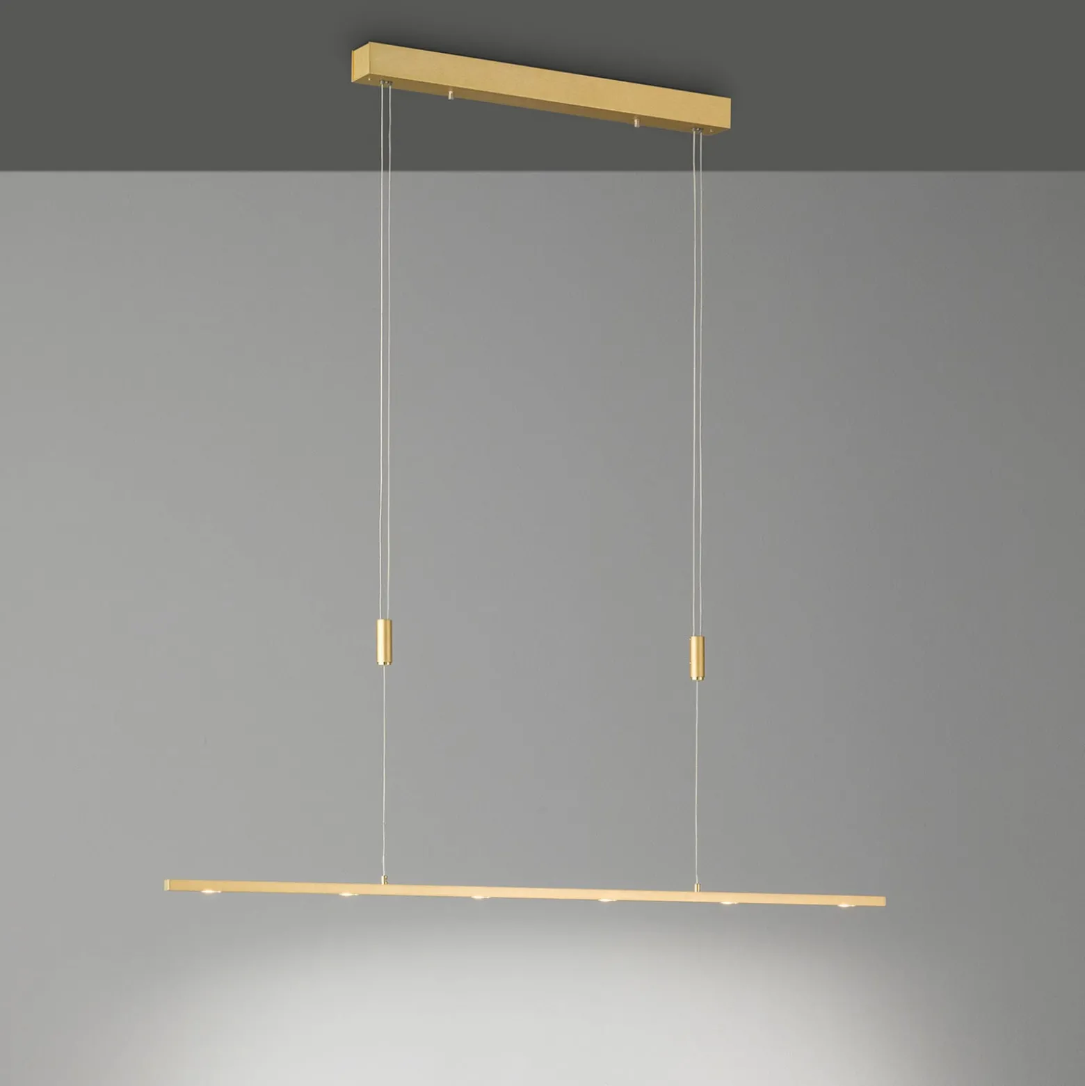 Quitani LED-Pendellampe Tolu, Länge 119 cm, messing
