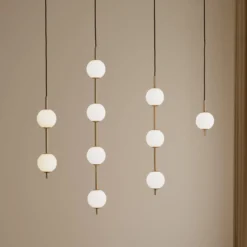 UMAGE LED-Hängeleuchte Audrey, messingfarben, 2-flg. Ø 12 cm